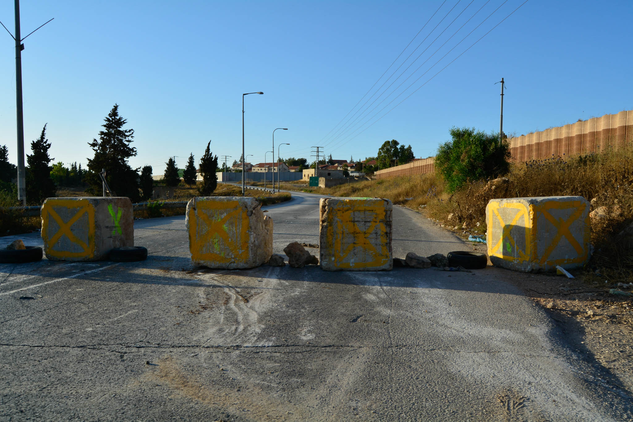 A visit to Ramallah with Fareed Ta'amallah This the main road from Ramallah to Nablus. The previous day it was open and on this day it was closed for no apparent reason. Residents have to find alternative routes.