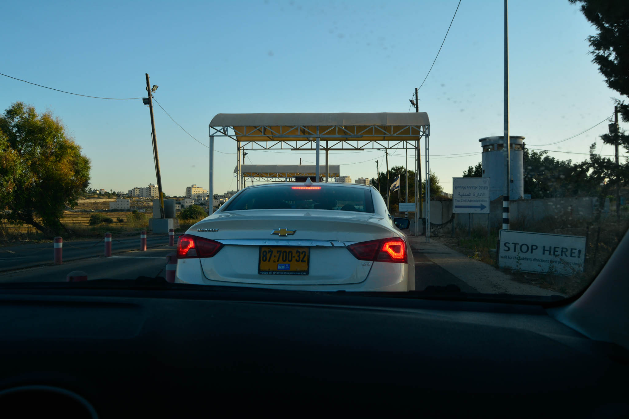 A visit to Ramallah with Fareed Ta'amallah This is the checkpoint at the Israeli Settlement. Special permits are required for Palestinians who want to use this checkpoint.